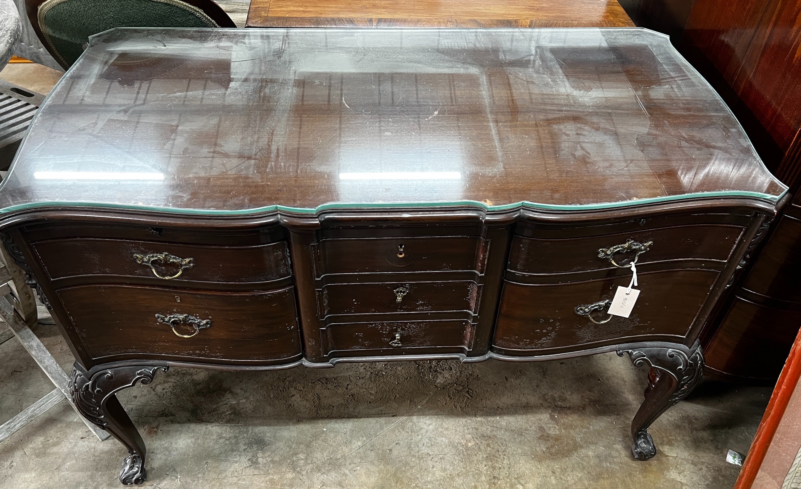 A Chippendale revival mahogany seven drawer dressing table, width 120cm, depth 59cm, height 79cm *Please note the sale commences at 9am.